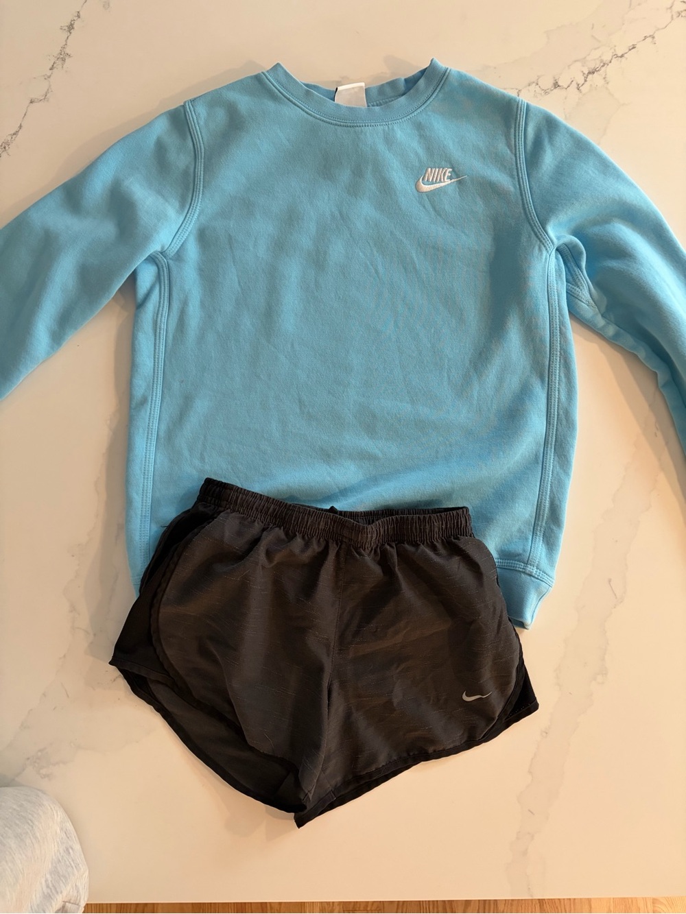Nike Sky Blue Crewneck Sweatshirt with Black Running Shorts